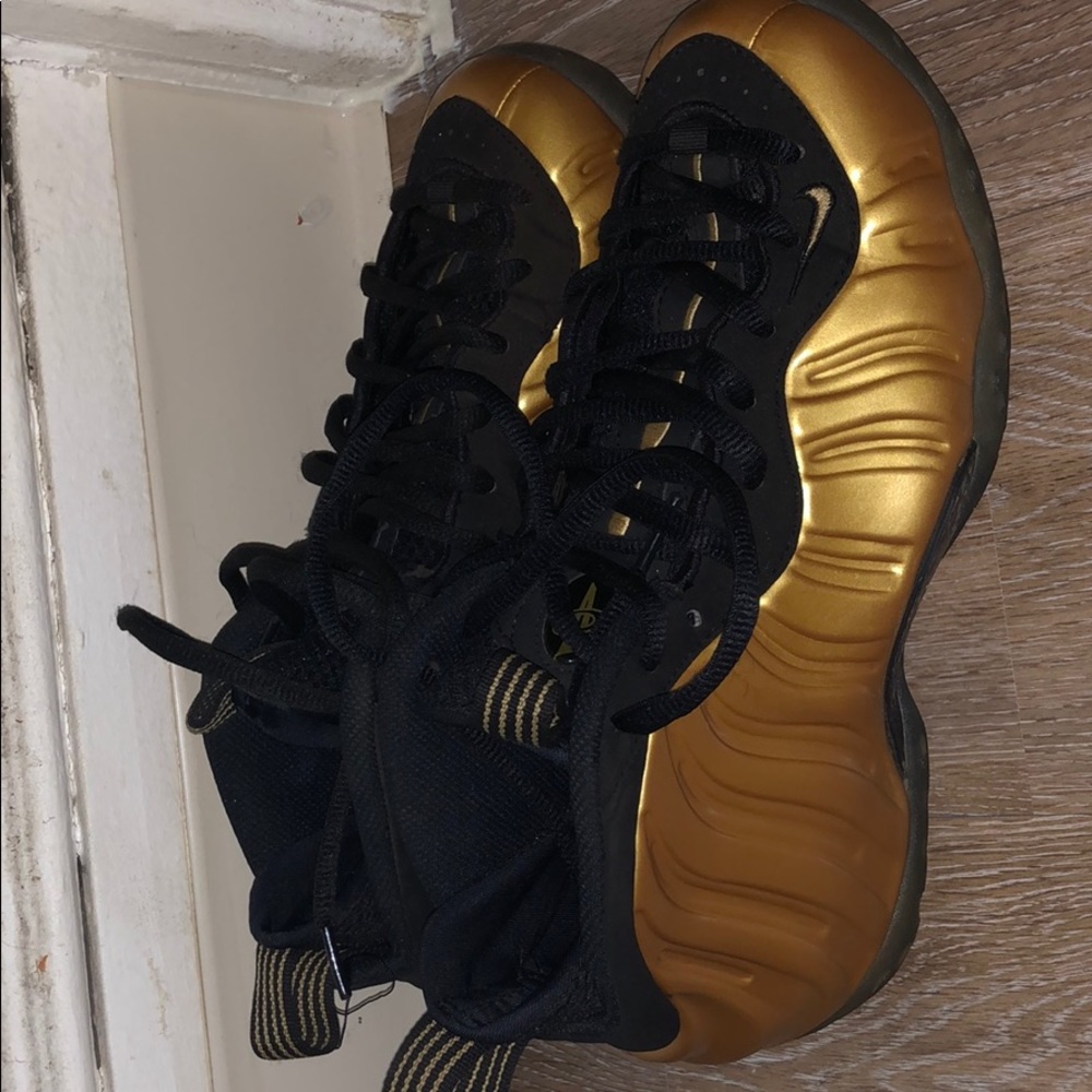 Gold Foamposite ones